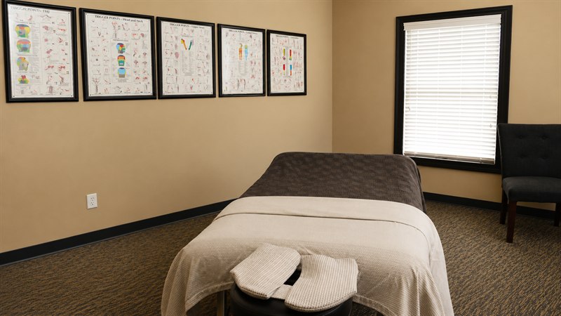 Massage therapy room at Aches Away